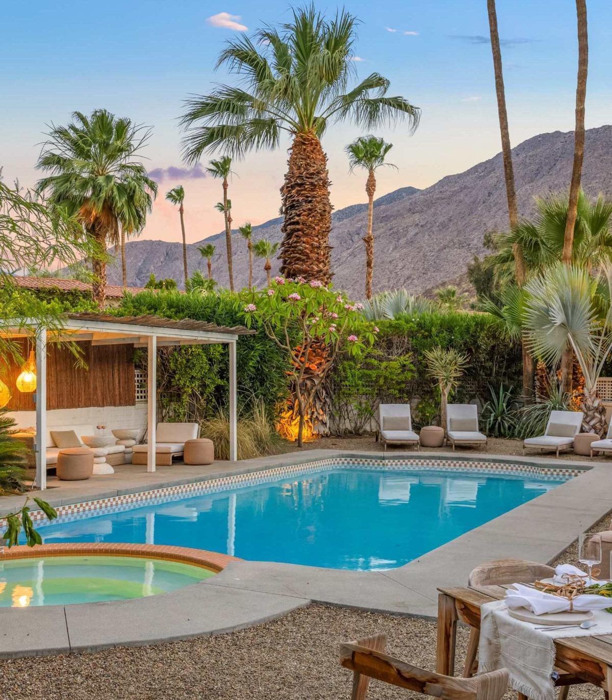 Palm Springs vacation rental with incredible pool, hot tub, and backyard area